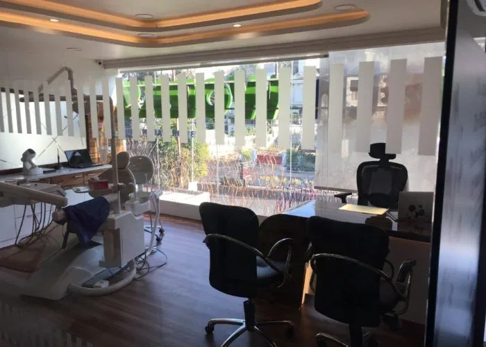 Consultation desk beside the treatment chair